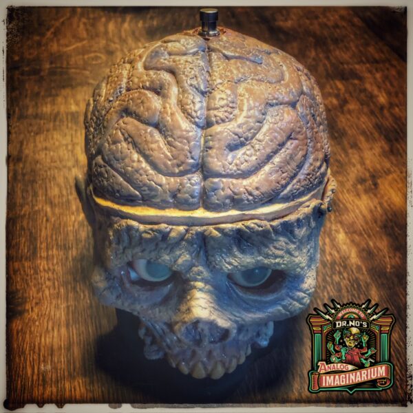 Fuzzadelic Skullshow by Dr. No Effects Zombie Skull by Cody Snyder.